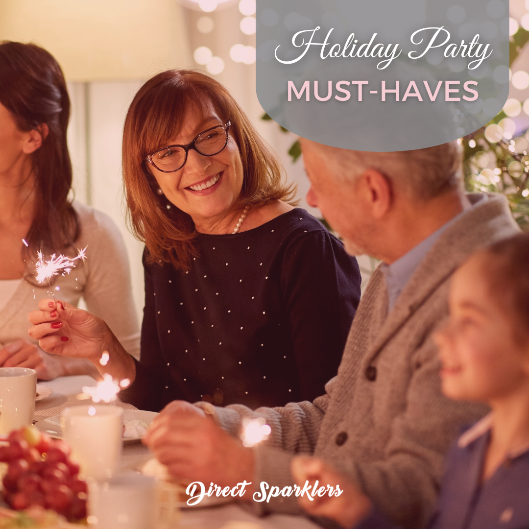 older woman sitting at table smiling with sparkler
