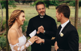 couple-getting-married-by-an-officiant-and-saying-their-vows