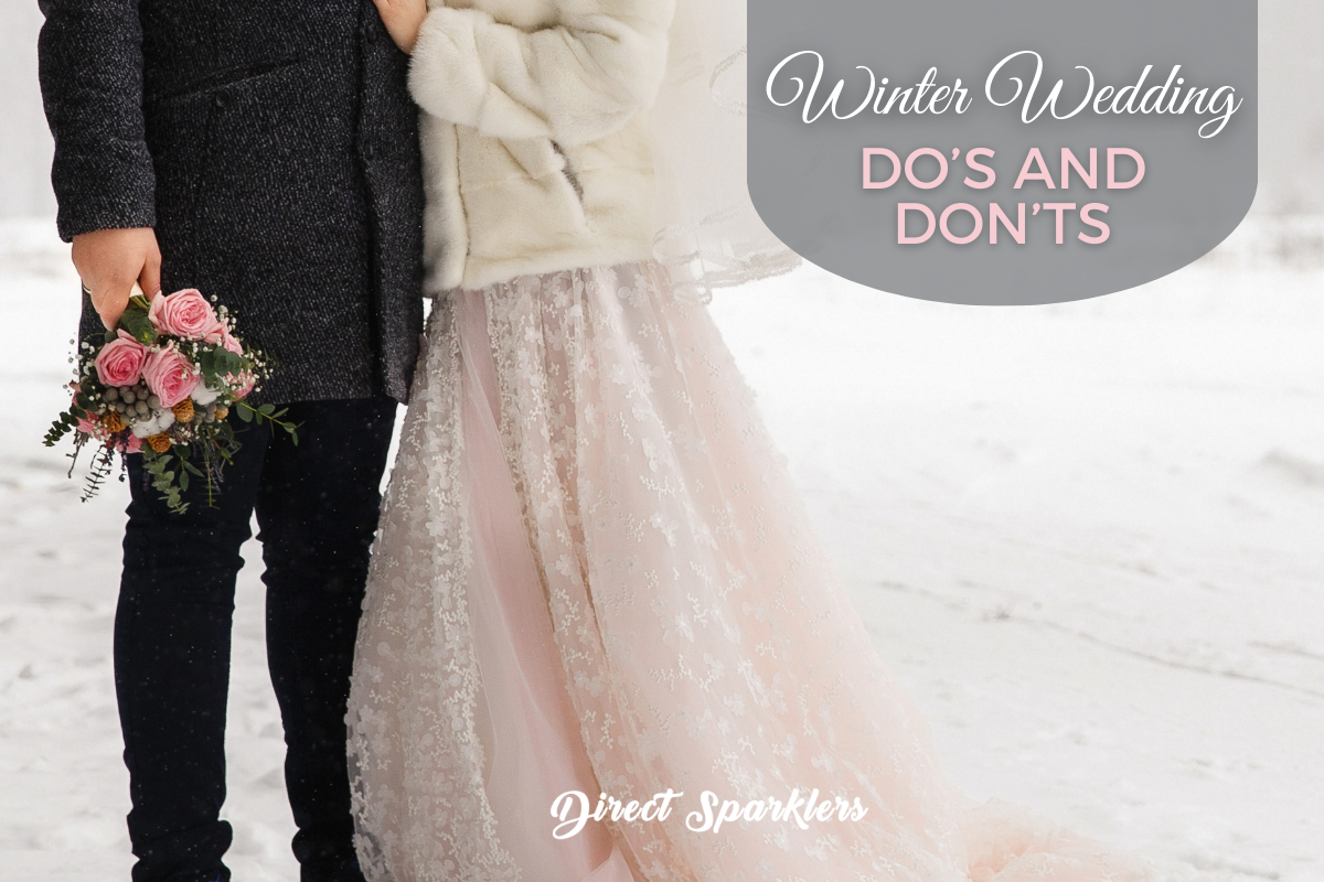 couple standing in the snow at a winter wedding