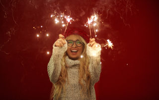 woman having fun with #36 sparklers